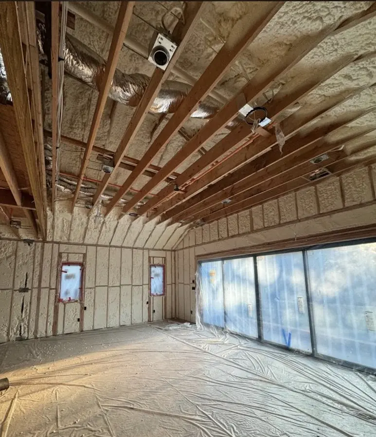 Interior walls and ceiling insulated with spray foam during new construction in Brigham City